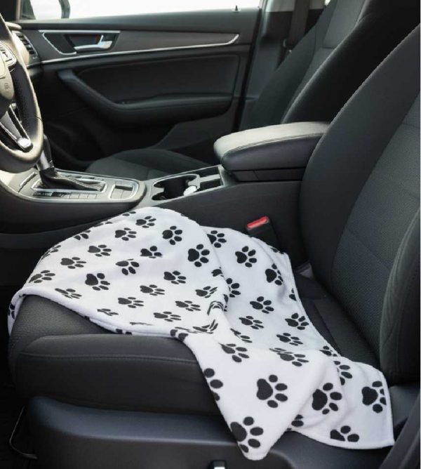 Pet seat protector towel with black paw prints on white microfiber